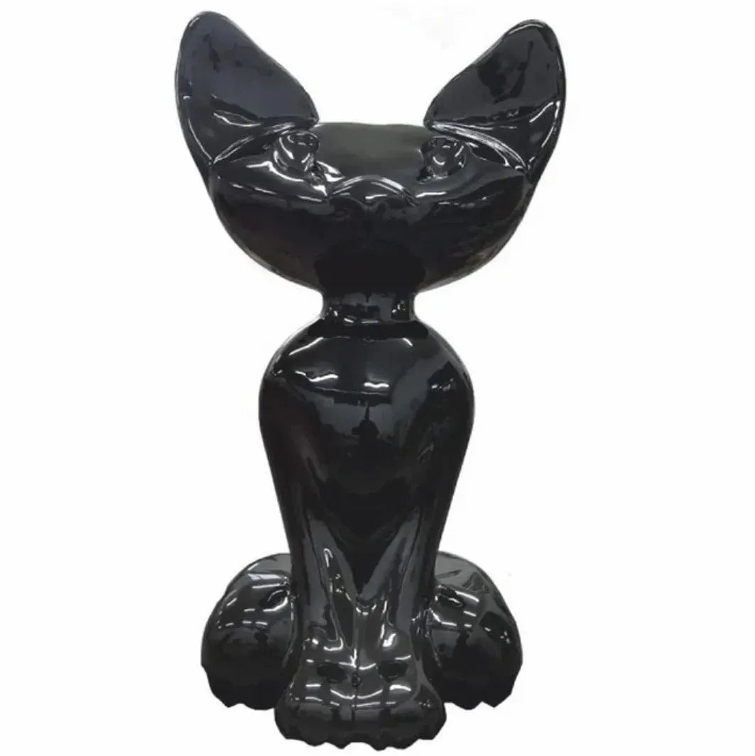 luxuswerbung-giraffe-skulptur-katze-sitzend-schwarz - Luxuswerbung.de
